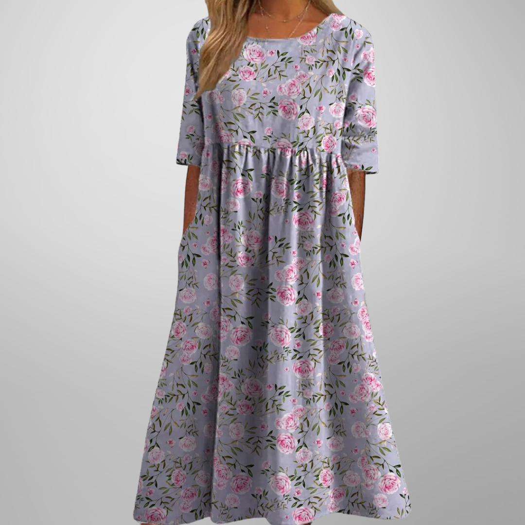 Relaxed floral midi dress with flowing cut in soft feminine print, effortless everyday elegance
