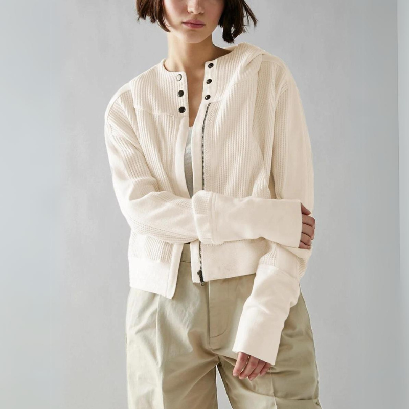 Cropped textured knit hoodie in neutral tone with unique hybrid button-to-zip closure