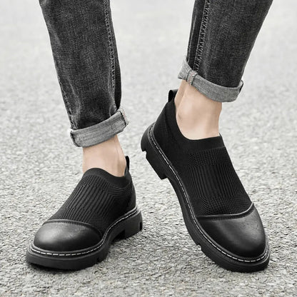 Black Beverly mesh ankle boots with breathable open-knit construction and sleek urban silhouette