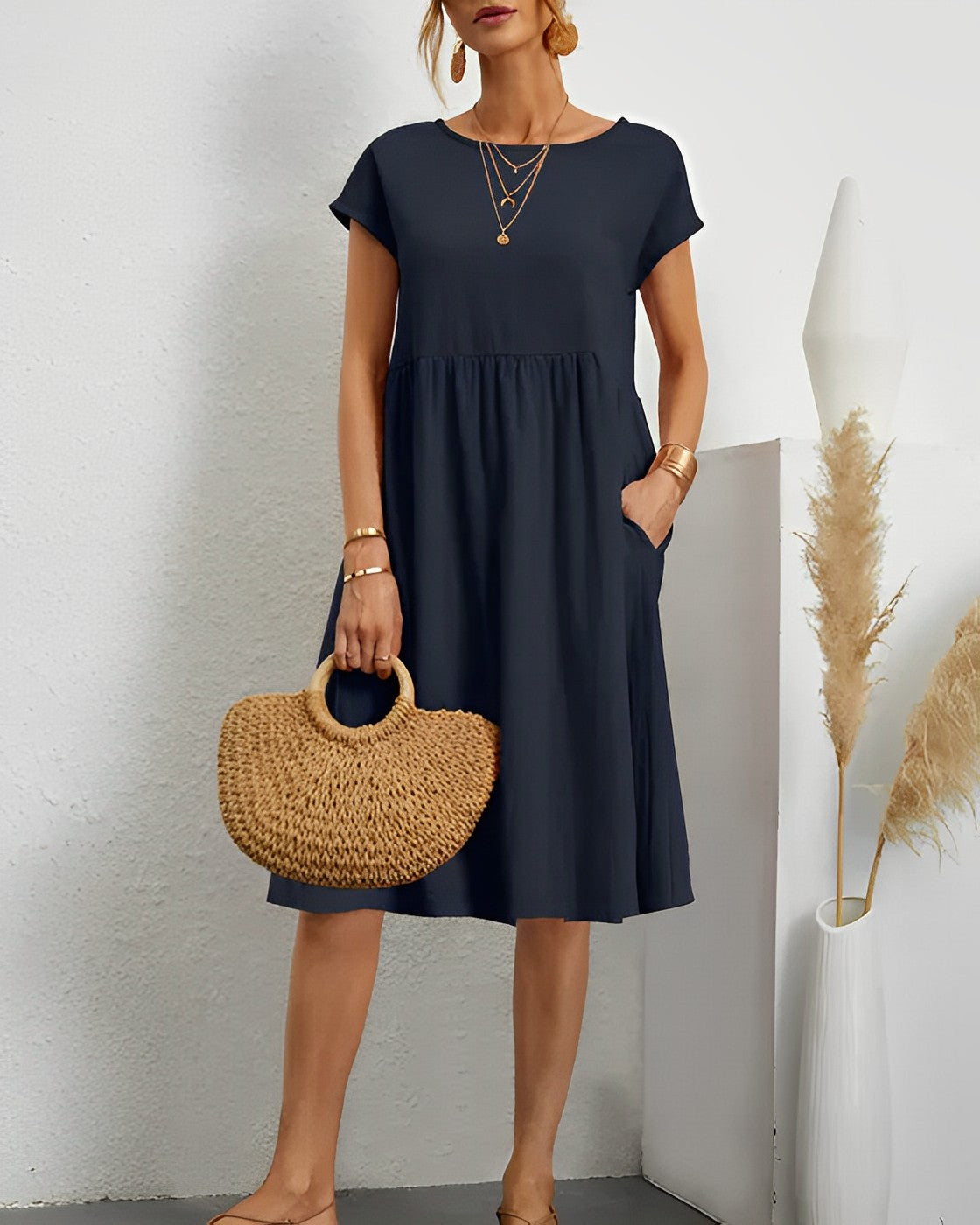 Women's loose fit midi dress short sleeves round neck casual style with practical pockets