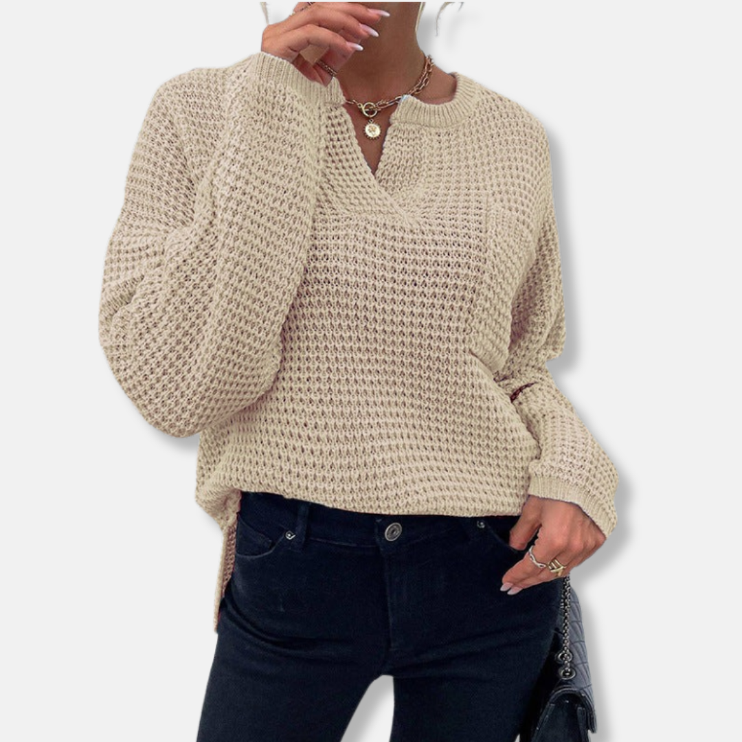 Women's beige waffle knit relaxed-fit sweater with notched round neck and cuffed long sleeves