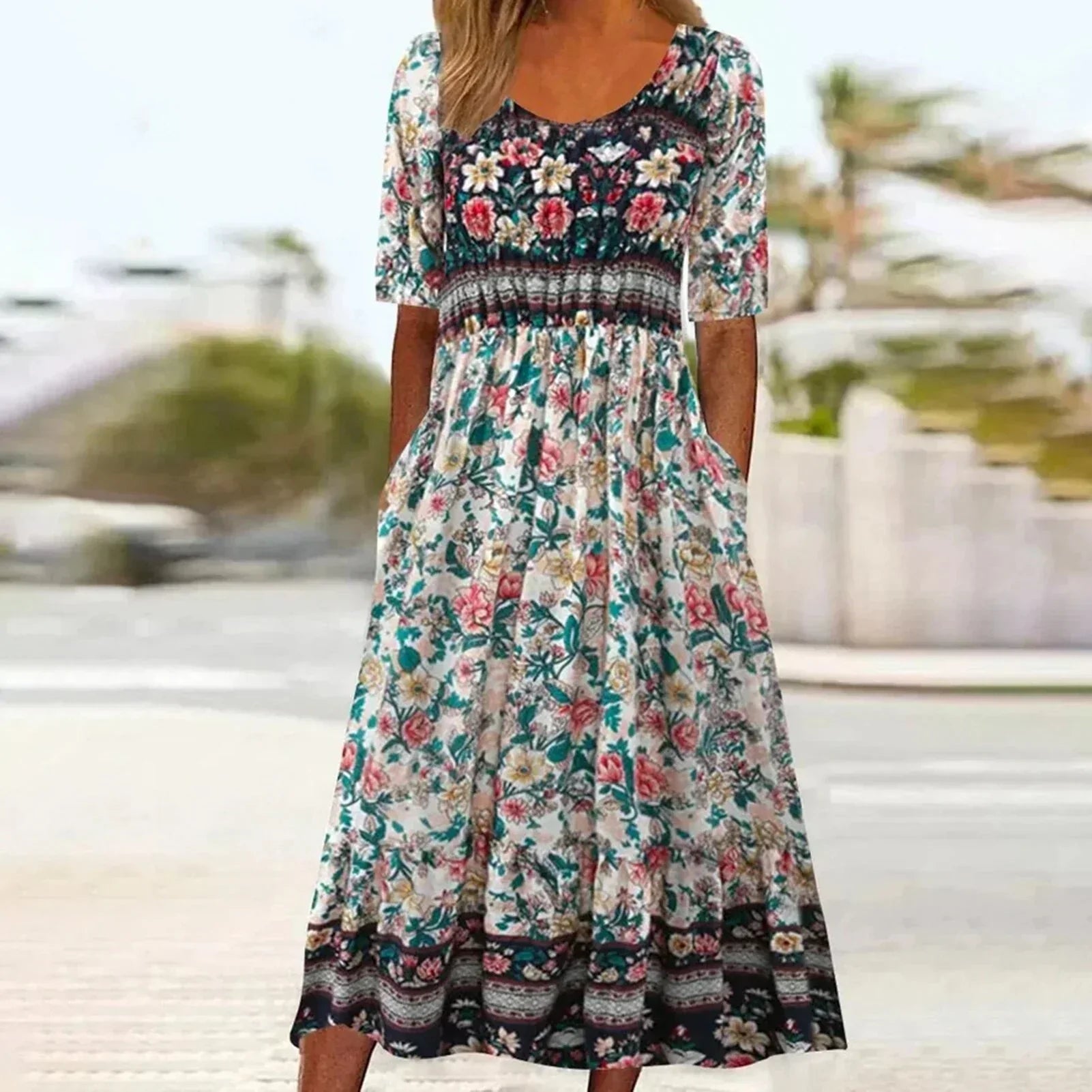 Floral bohemian print midi dress with round neckline and relaxed flowing silhouette