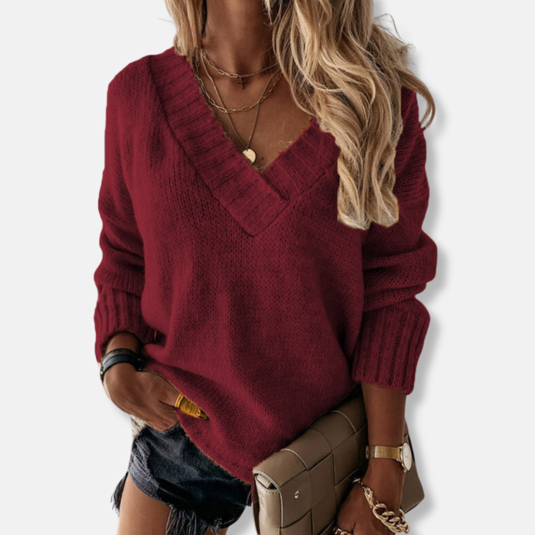 Women's relaxed-fit knit sweatshirt with deep V-neck, ribbed hem, and long sleeves for everyday style