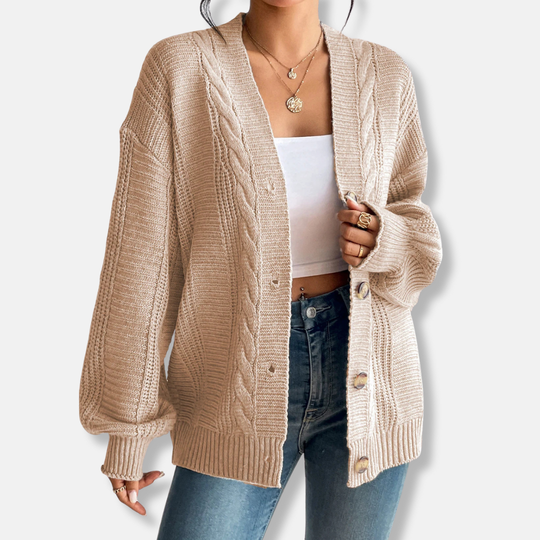 Women's oversized wool blend cable knit cardigan in neutral tones, button front cozy fall essential