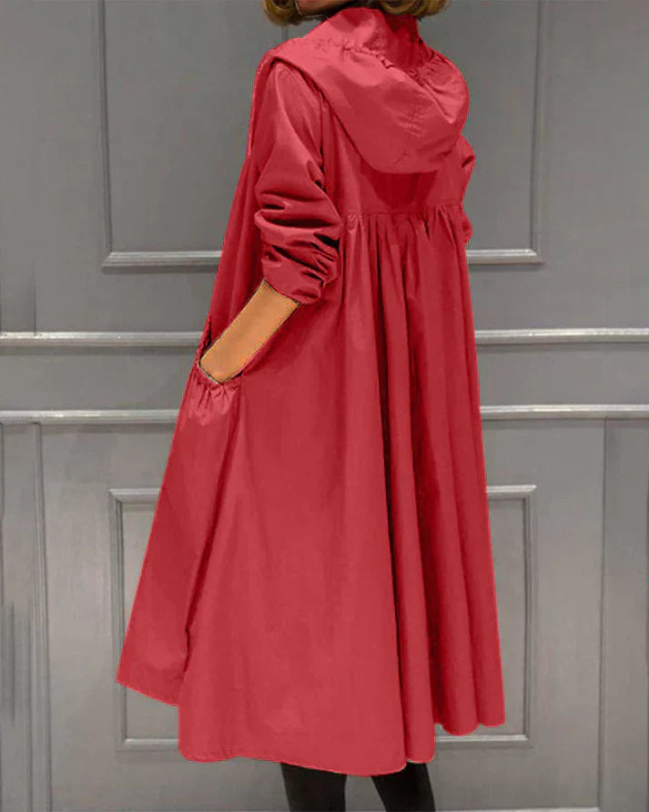 Women's knee-length relaxed fit hoodie with full zipper and front pockets, cozy outerwear