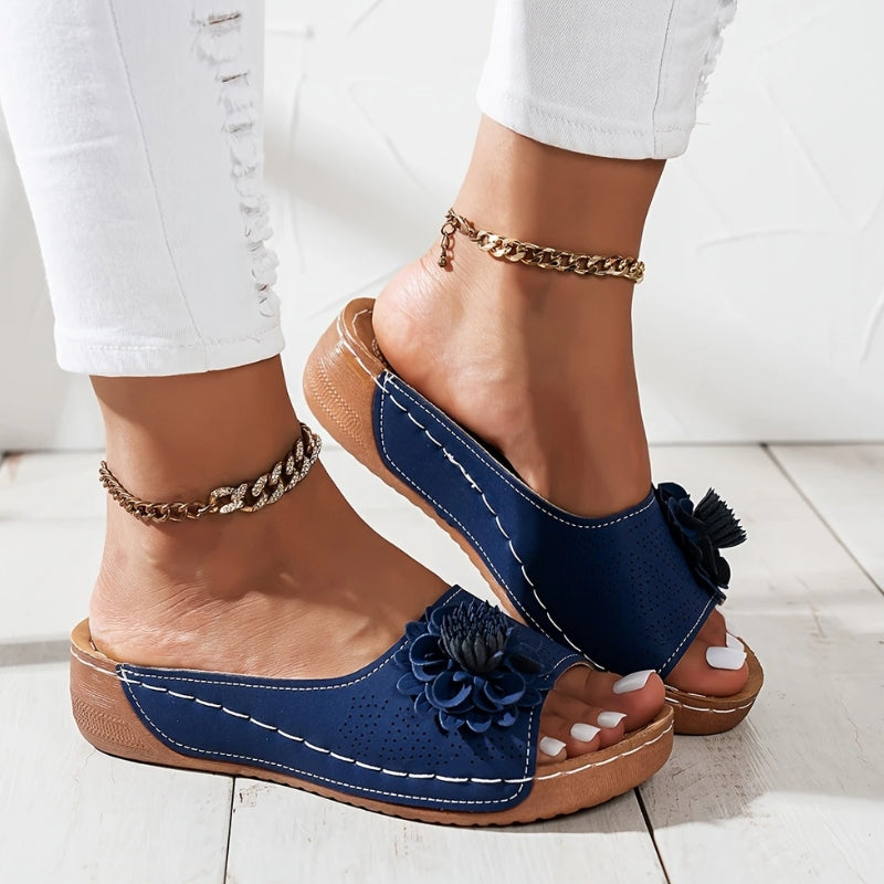Women's floral slip-on wedge sandals with perforated upper, open toe slides, delicate flower appliqué