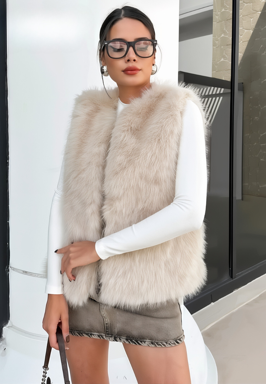 Women's ivory faux fur sleeveless open-front vest with plush texture for elegant layered looks