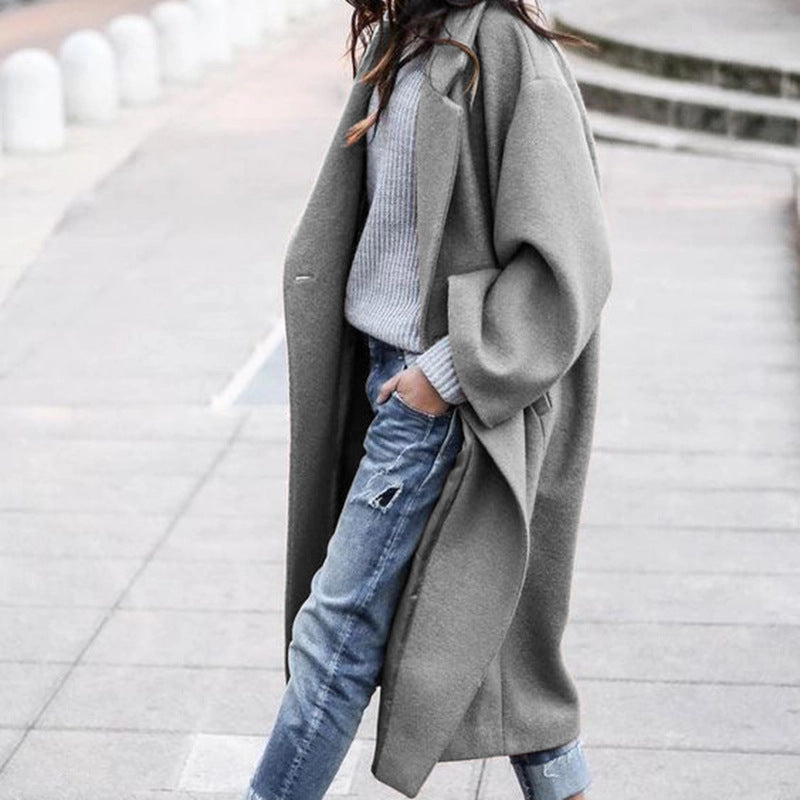Evelyn women's long coat beige minimalist silhouette notch lapel soft polyester pockets cold weather