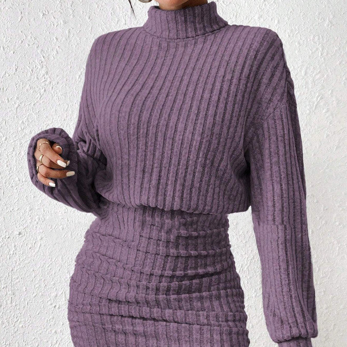 Ribbed knit turtleneck midi dress cozy winter style in neutral tone with structured texture