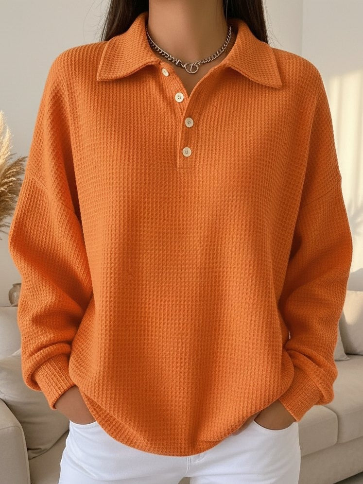 Gray textured polo sweater with ribbed knit pattern and classic collar for smart-casual style