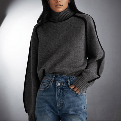 Ivory organic cotton turtleneck sweater with ribbed collar and relaxed elegant fit