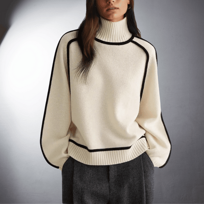 Ivory organic cotton turtleneck sweater with ribbed knit texture and slim elegant silhouette