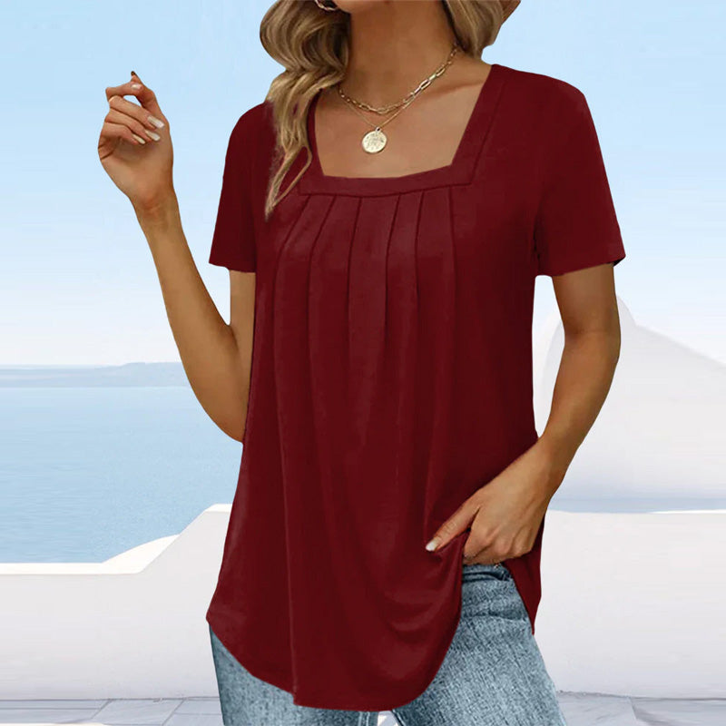 Elegant pleated blouse with soft front pleats, timeless structured silhouette for work or casual wear