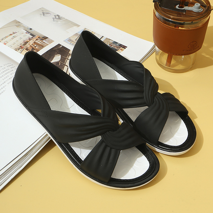 Women's beige knot-detail sandals with cushioned sole, elegant minimalist silhouette