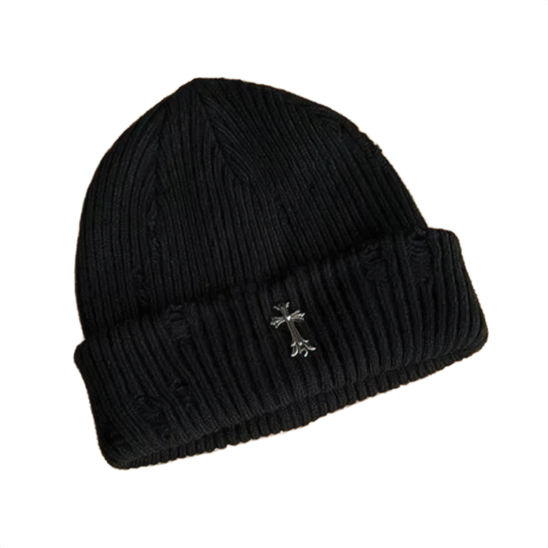 Black ribbed knit beanie with distressed finish and iron cross metal emblem, street style