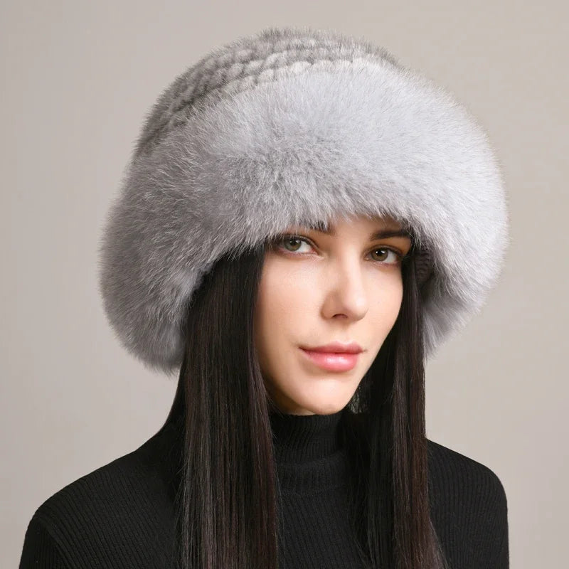 Solid fur hat with round crown silhouette and stylish fur brim for winter elegance