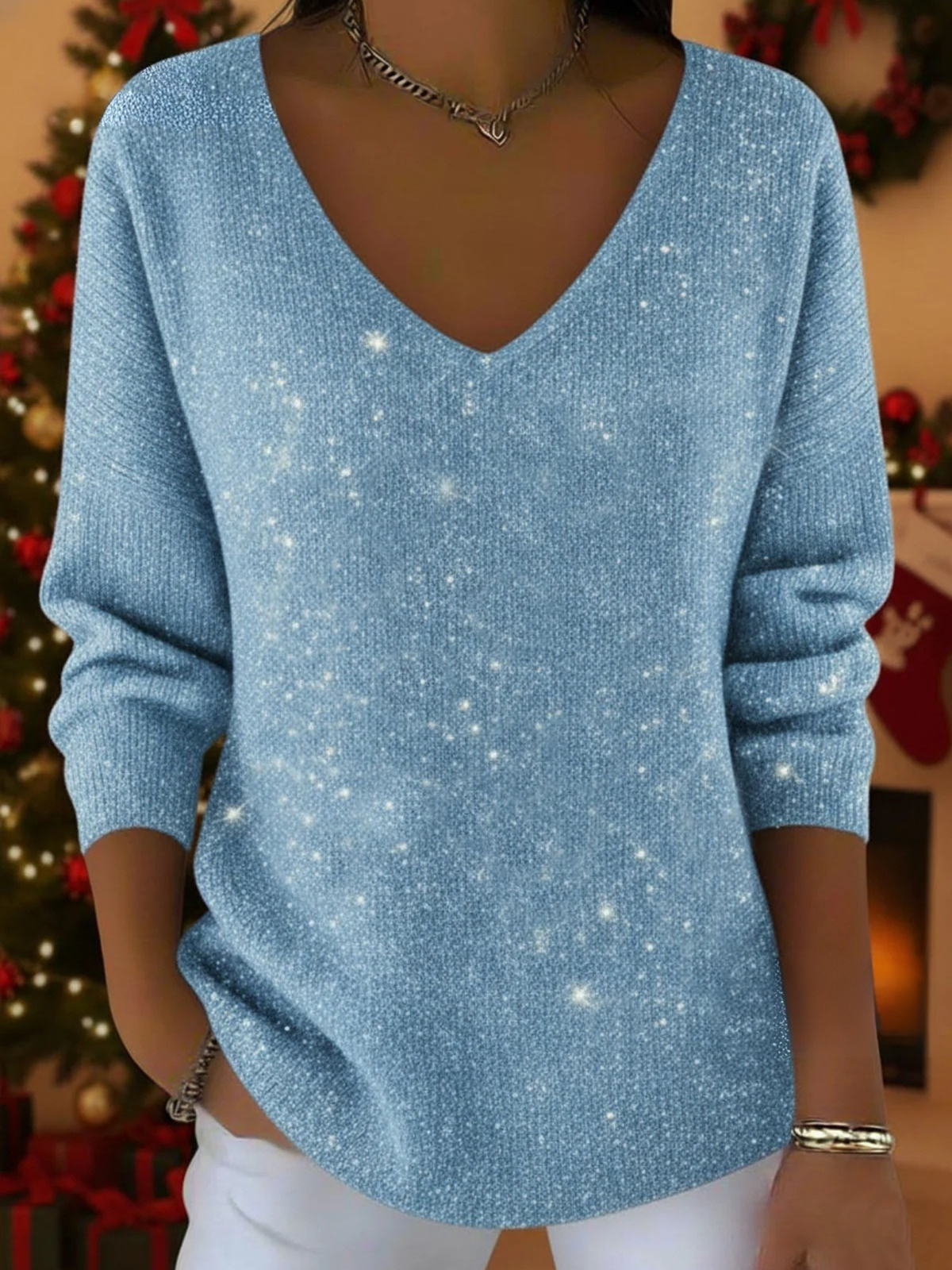Festive red V-neck jumper with flattering elongating cut and seasonal charm