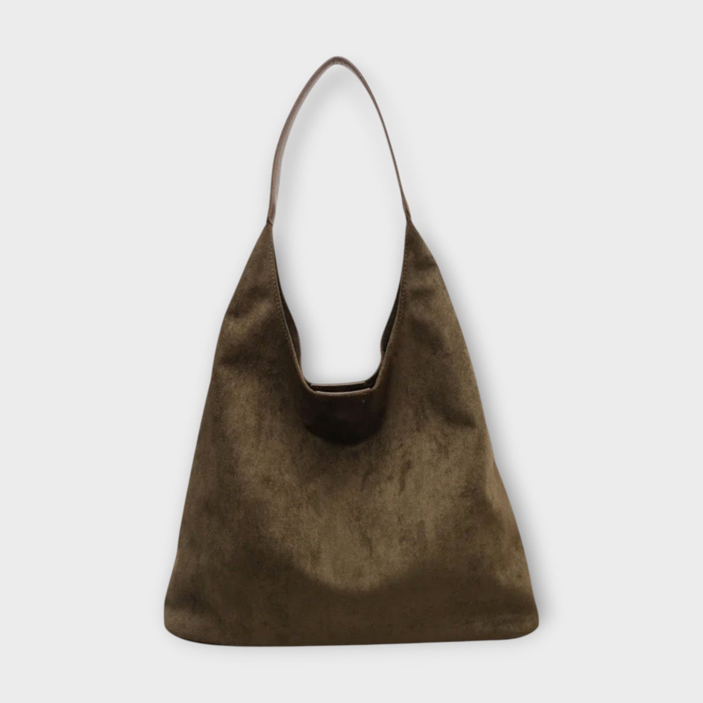 Minimalist beige shoulder bag with clean lines, soft structured silhouette, and simple single strap
