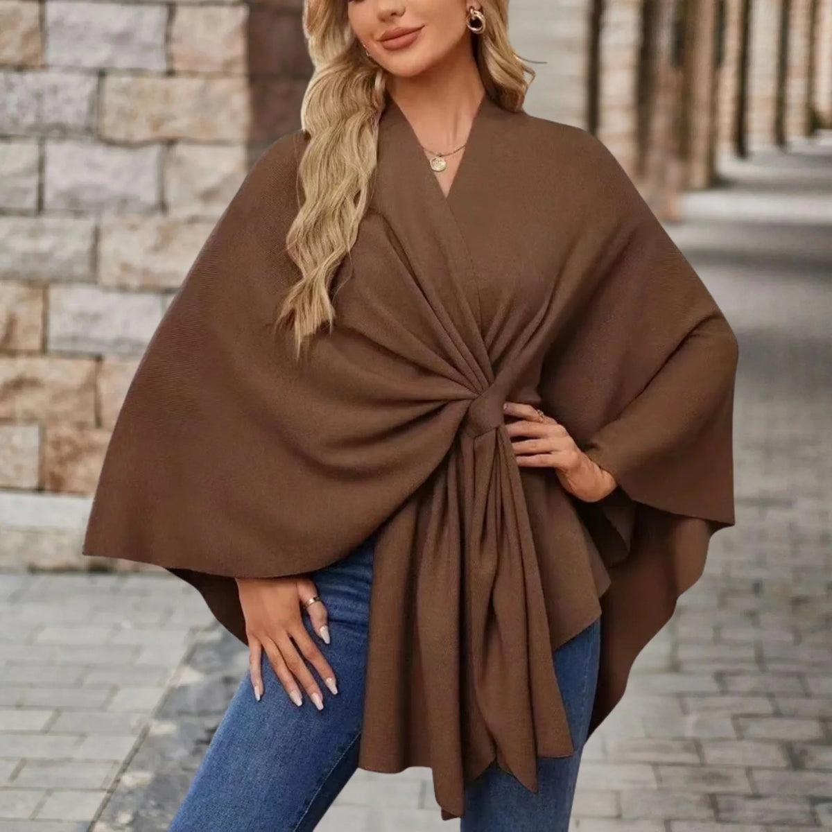 Elegant draped poncho with chic front knot, flowing silhouette, soft cozy wrap layer for women