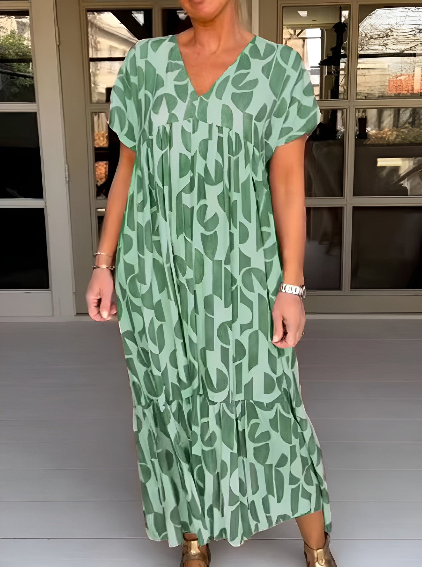 Women's ivory V-neck flowy midi dress with softly draped silhouette and elegant evening styling