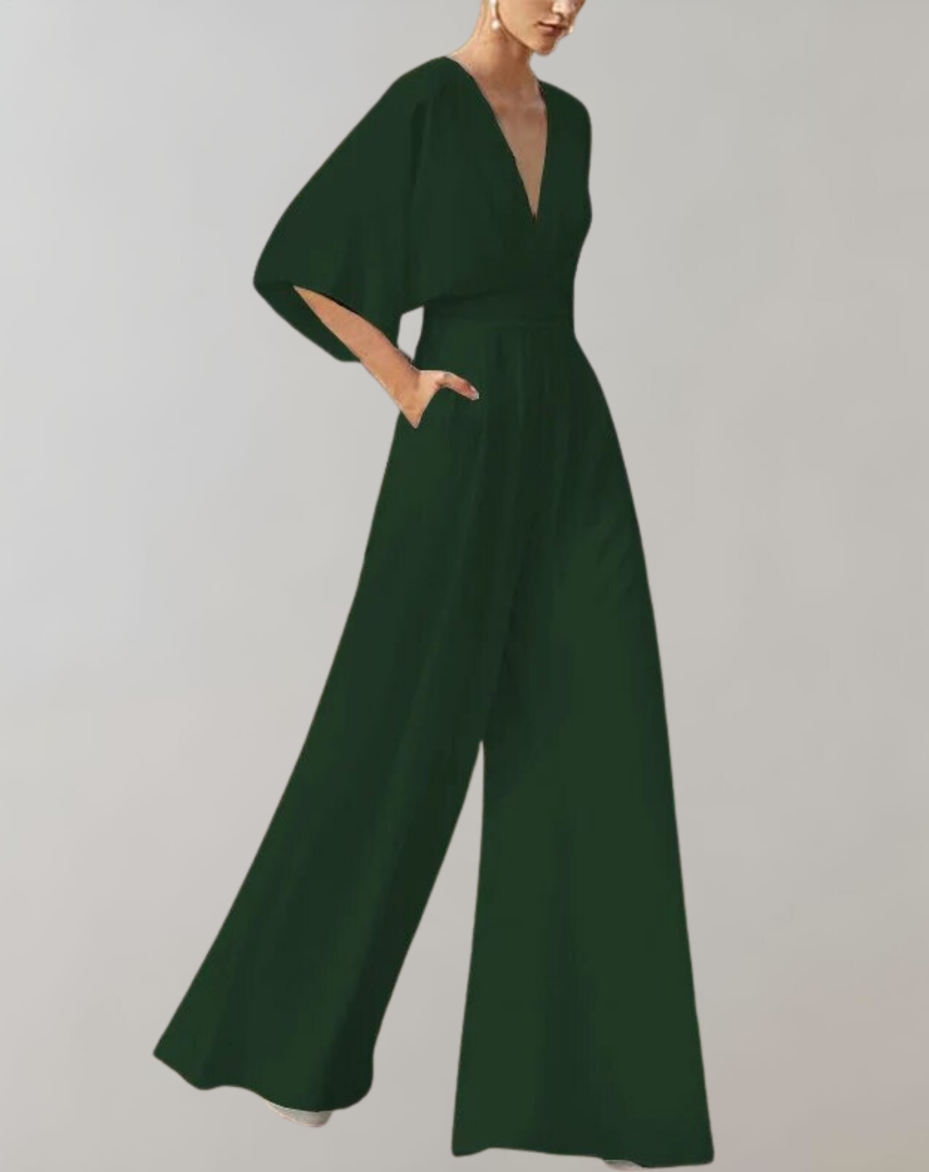 Blush pink wide-leg jumpsuit with plunging V-neck and dramatic batwing sleeves for formal occasions