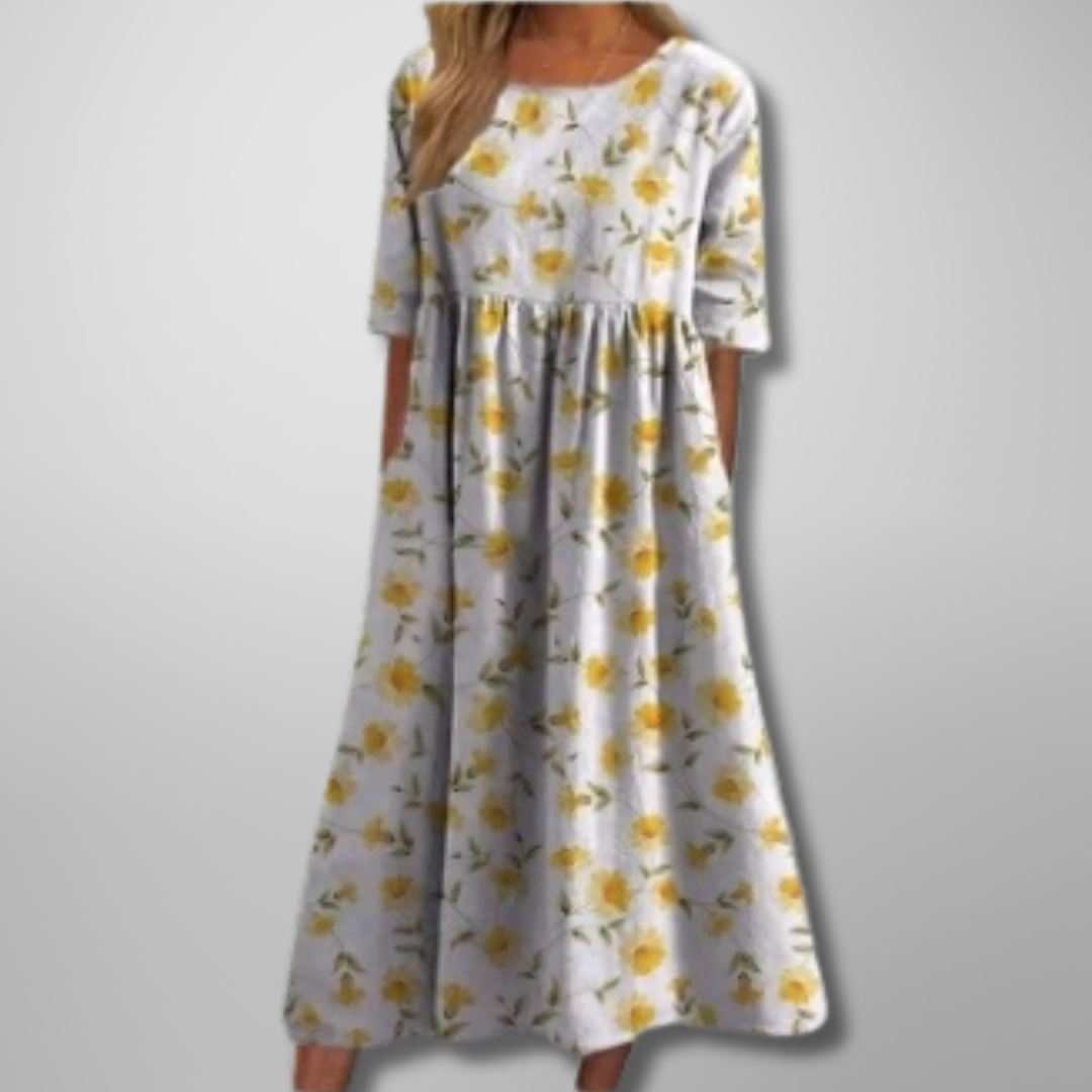 Relaxed floral midi dress with flowing cut and feminine silhouette for effortless everyday elegance