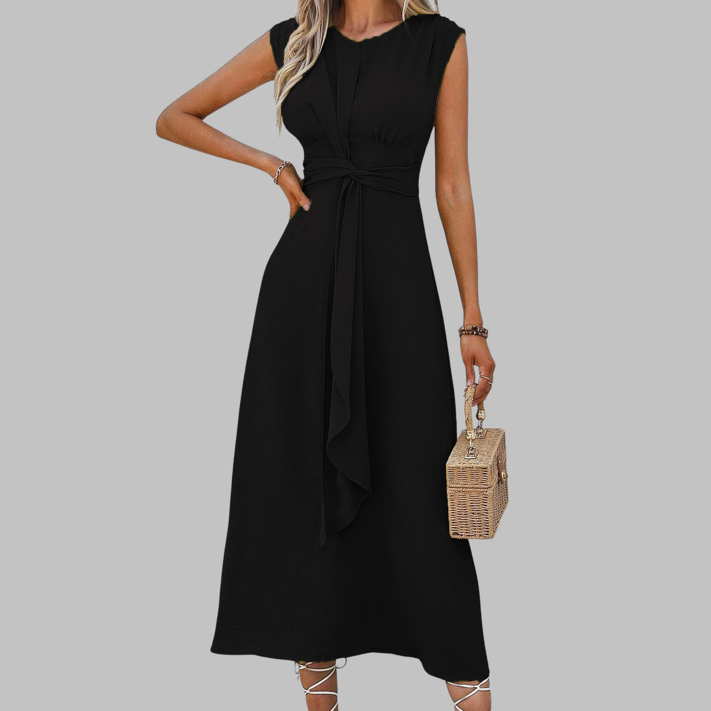 Elegant sleeveless maxi dress in a round neckline cut, flowing silhouette for refined occasions