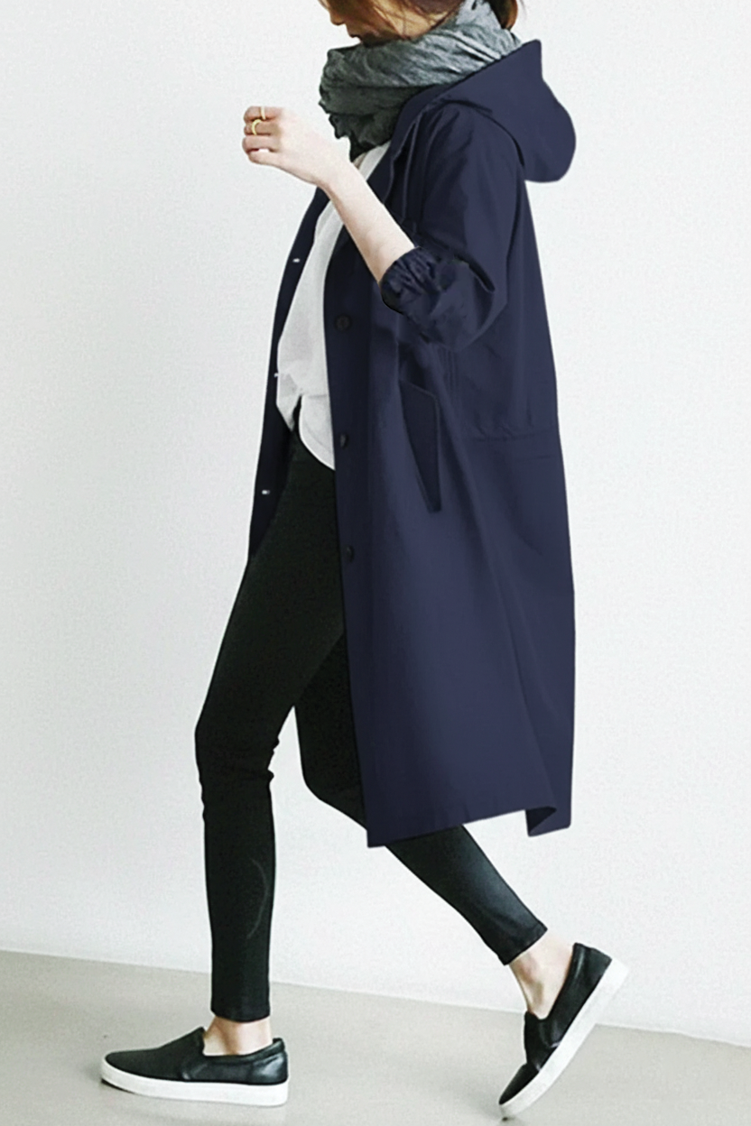 Beige hooded trench coat with belted waist and structured silhouette for everyday elegance