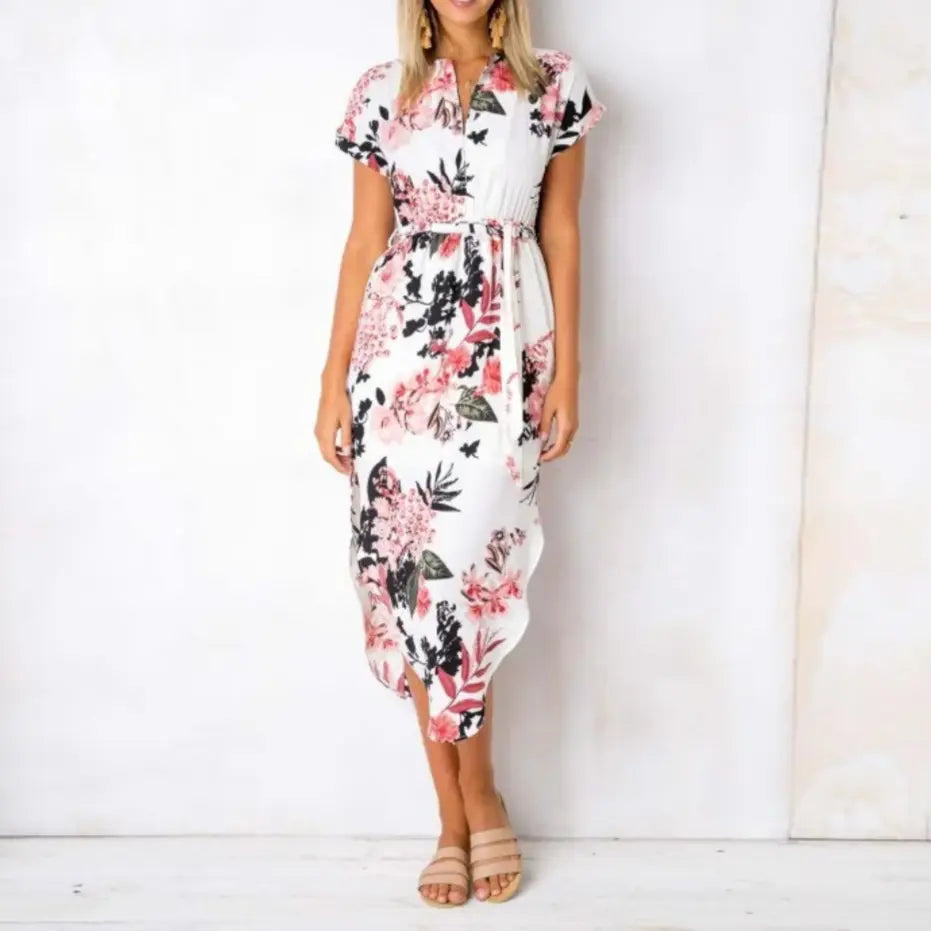 Black midi wrap dress with tied waist and vivid floral print, sleek silhouette for effortless elegance