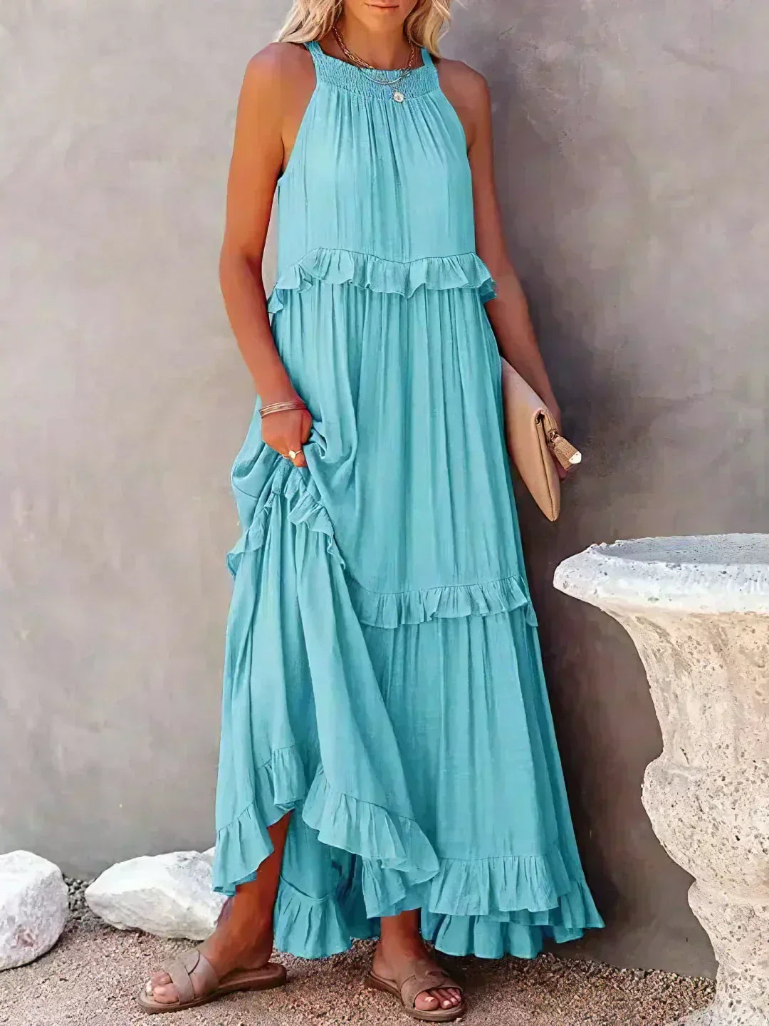 Elegant sleeveless dress with delicate ruffle details, soft feminine silhouette for special occasions