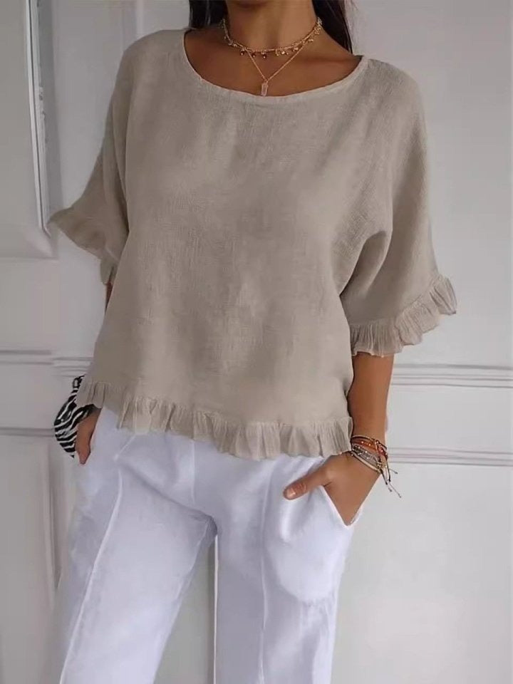 Soft blue lightweight women's blouse with minimalist cut and timeless casual elegant silhouette
