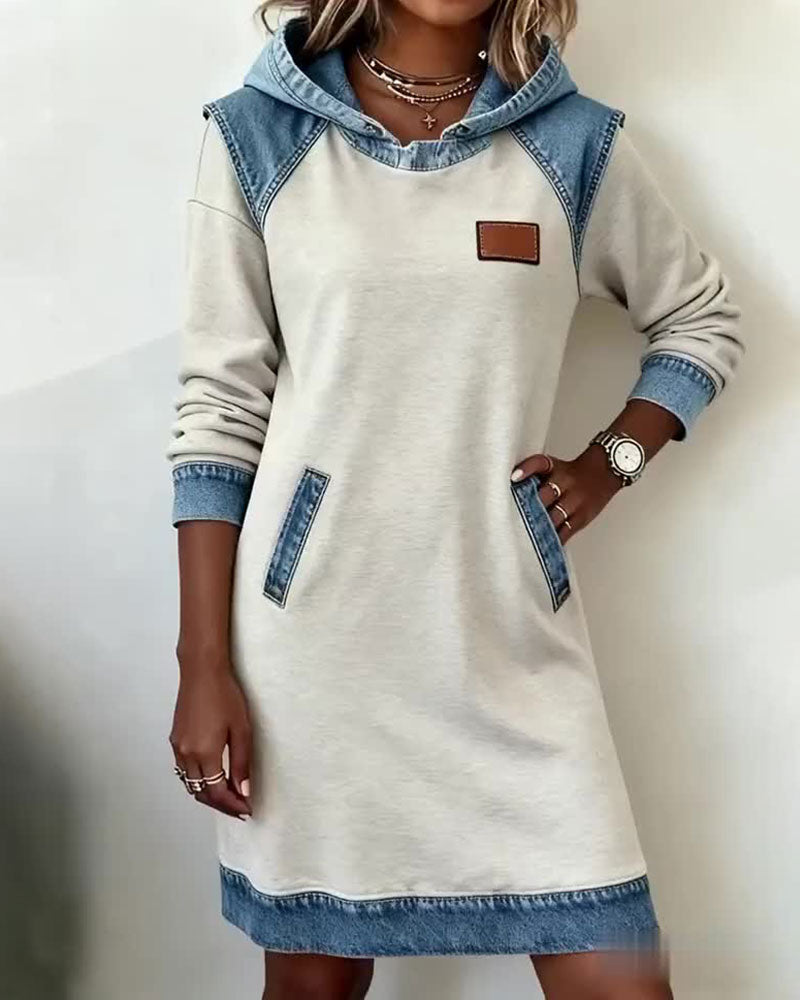 Blue denim midi dress with figure-enhancing waist-defining silhouette and feminine flattering cut