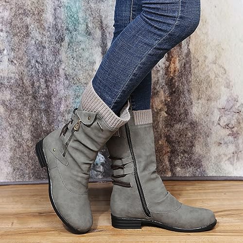 Women's black vegan leather ankle boots with sleek winter design and polished finish