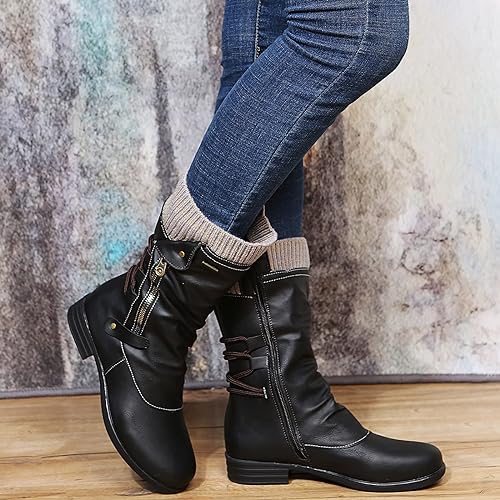 Women's black vegan leather ankle boots with sleek silhouette and chic winter-ready style