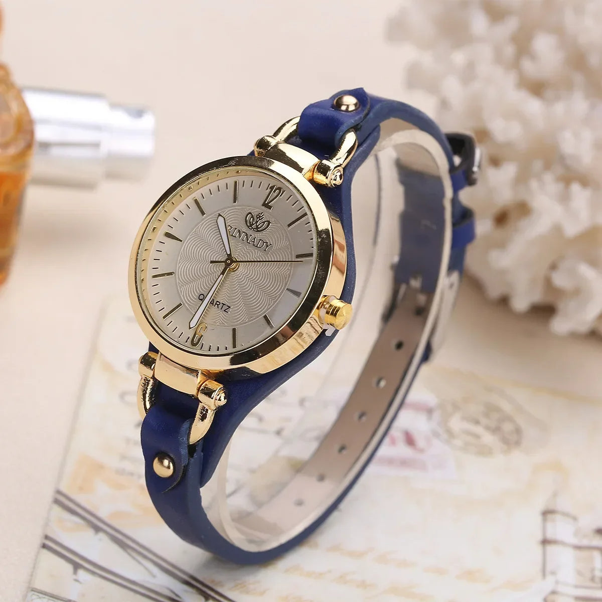 Sophie Elegant vegan leather watch gold-tone stainless steel case quartz minimalist refined silhouette