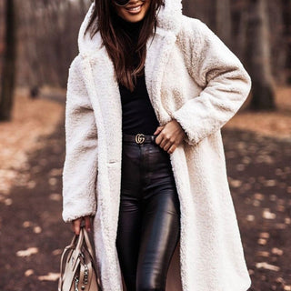 Women's beige faux fur hooded longline coat with plush oversized silhouette for cozy winter warmth