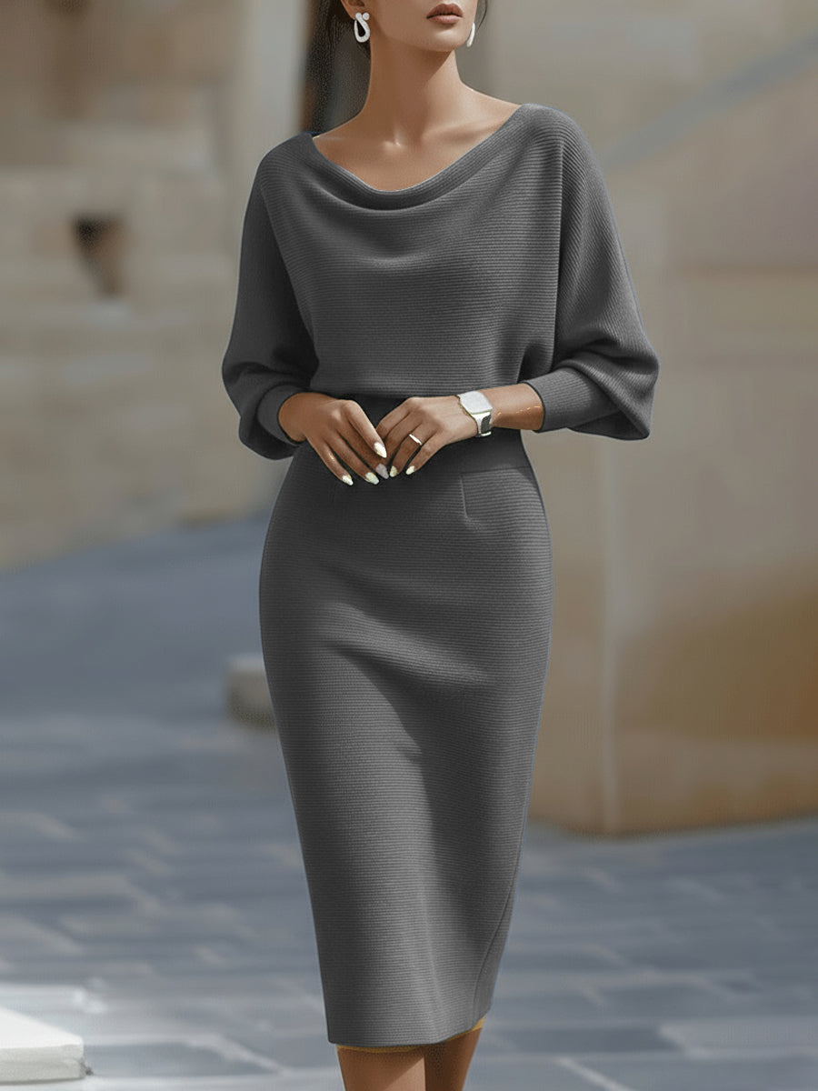 Ivory luxurious midi dress with fluid drape, flattering silhouette, and premium soft fabric finish