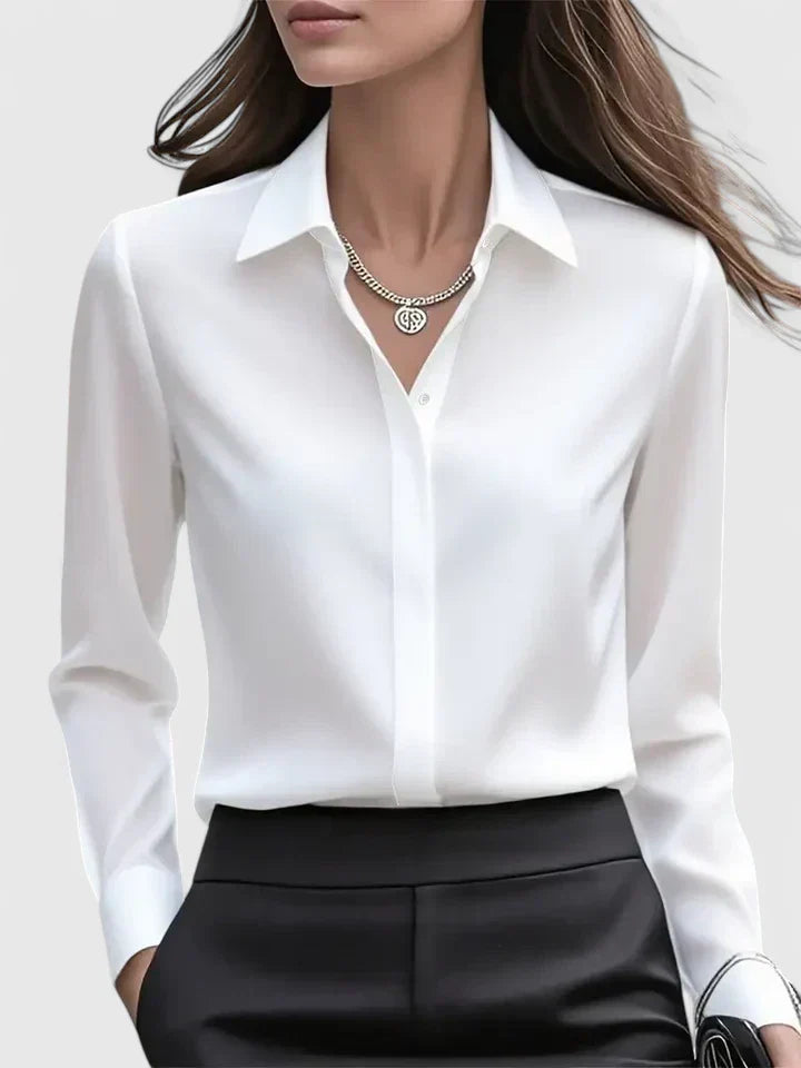 Navy blue satin women's button-down shirt with concealed placket, elegant slim office-ready silhouette