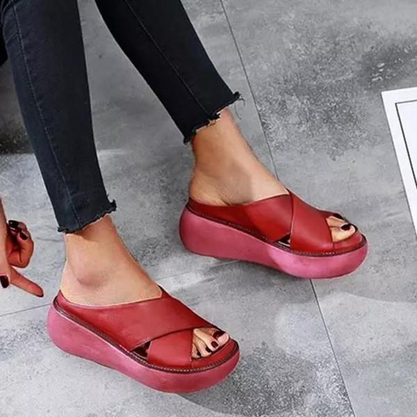 Women's flat cushioned X-strap sandals in neutral tone, elegant everyday style with secure fit