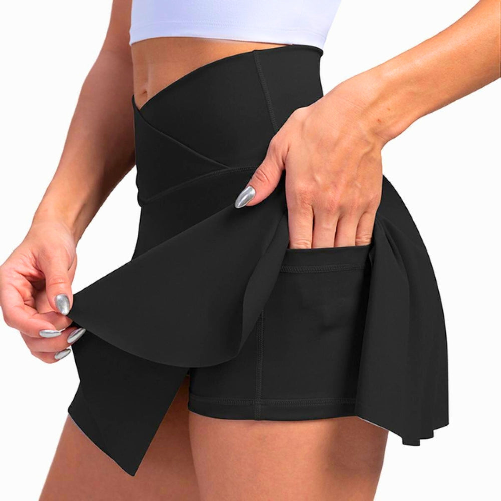 Tavro high-waist flared mini skirt with built-in shorts, front slits, and side pockets