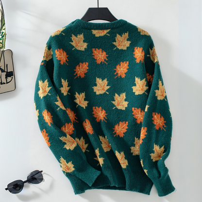 Maple Dream relaxed-fit knit sweater with tonal maple-leaf jacquard, ribbed cuffs, and round neckline