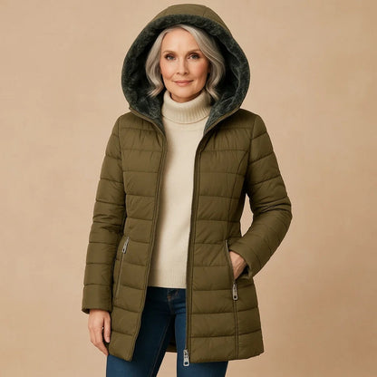 Nuvra oversized winter jacket with plush lining, sculpted cold-shield shell, and wraparound hood