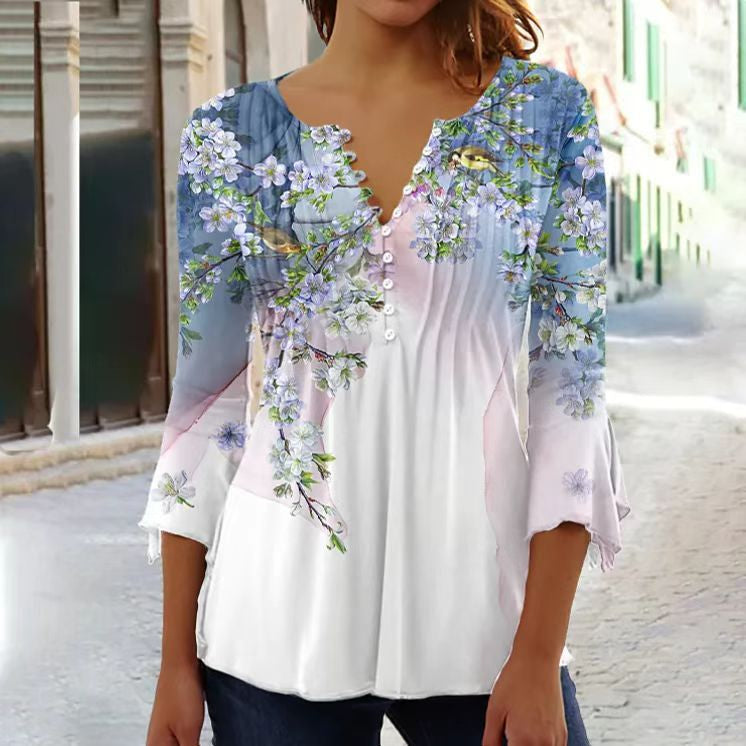 Floral women's blouse with scalloped neckline, flowing pleats, soft feminine everyday elegance style