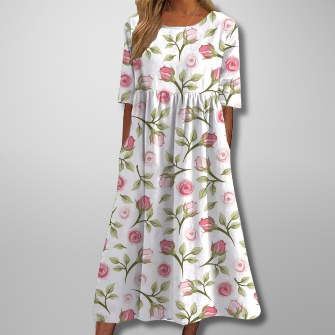 Relaxed floral midi dress in soft tones with flowing cut and feminine everyday style