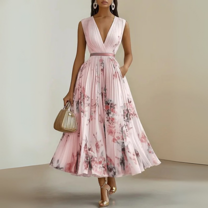Flowy sleeveless maxi dress in soft drape fabric with flattering V-neck, breezy feminine silhouette