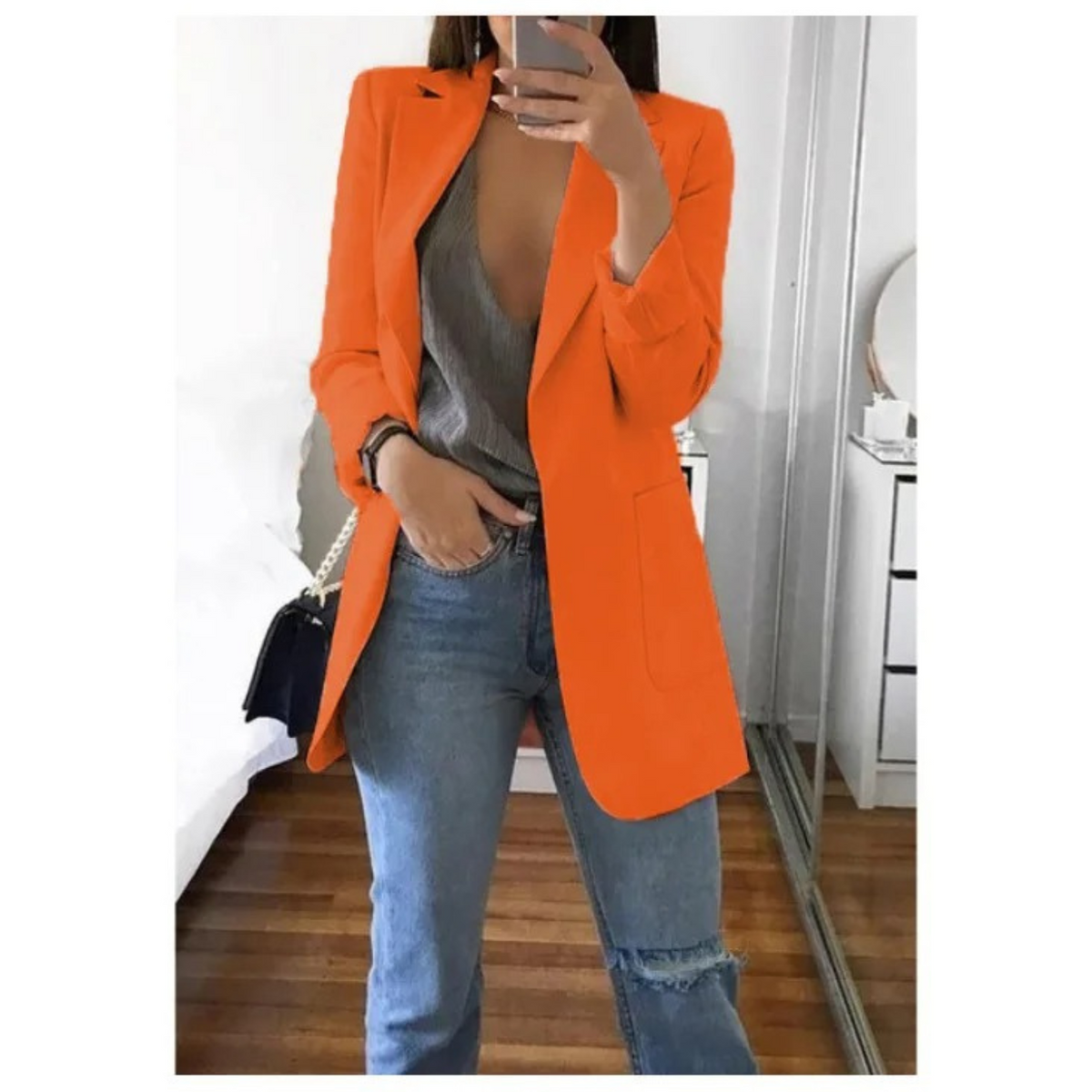 Women's structured single-breasted blazer with notched lapel and welt pockets, tailored silhouette
