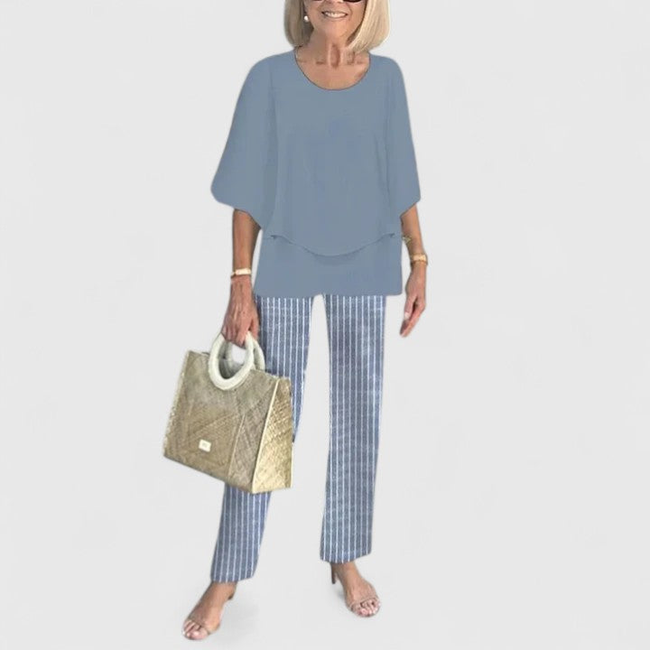 Sage green floral two-piece set with relaxed layered top and botanical print wide-leg pants