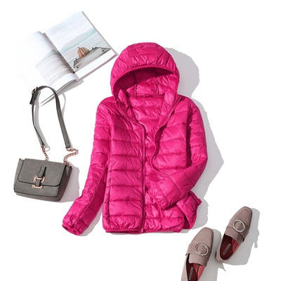 Women's short quilted puffer jacket front zip lightweight winter coat sleek silhouette