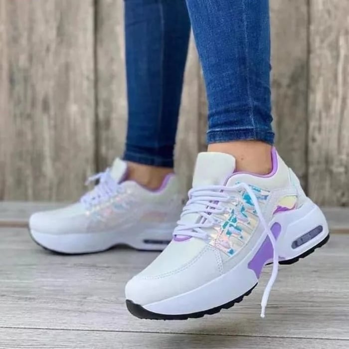 Women's chunky platform sneakers in white with gold-accented midsole, lace-up closure, breathable mesh upper