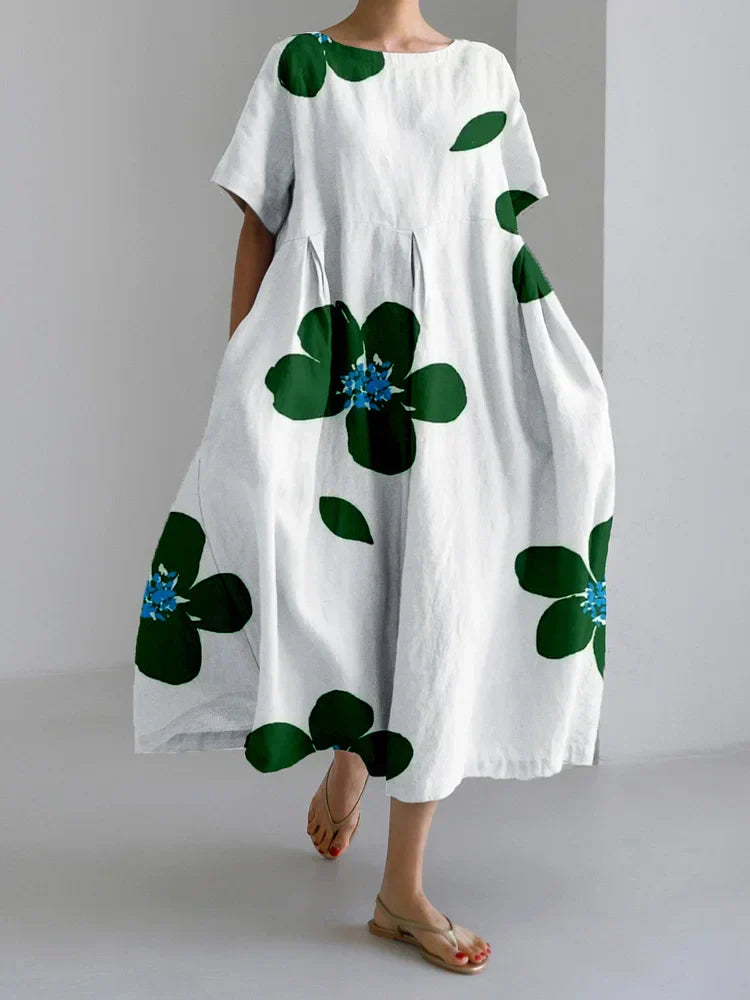 Floral maxi dress vibrant bloom print flowing relaxed cut with strategic pleat for effortless summer style